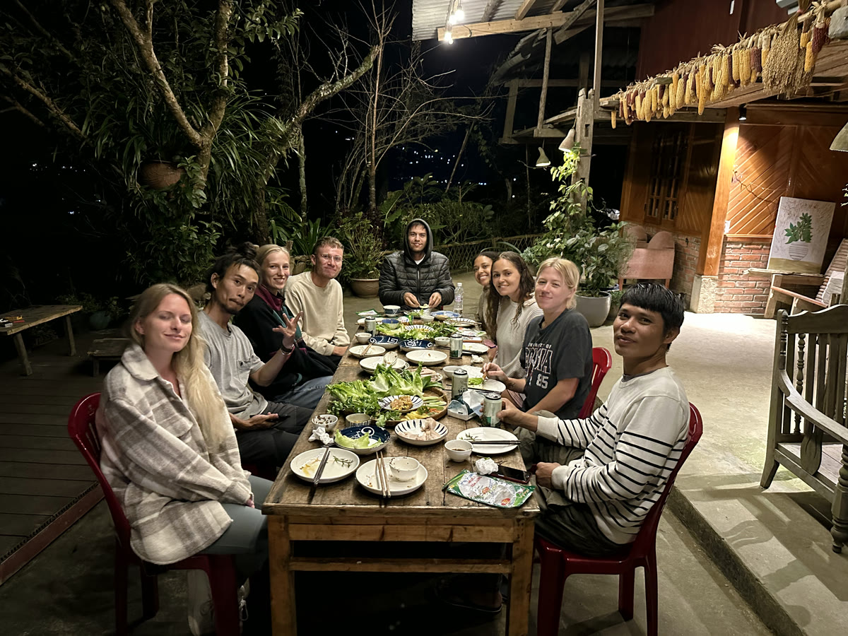 Homestay dinner table under string lights in Sa Pa, Vietnam